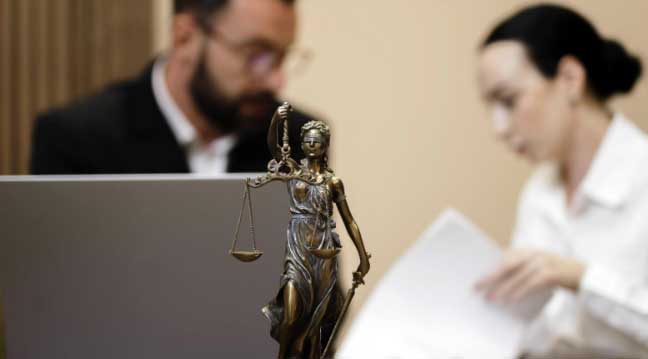 Legal team consultation with beverage business owner discussing comprehensive IP strategy and protection planning.